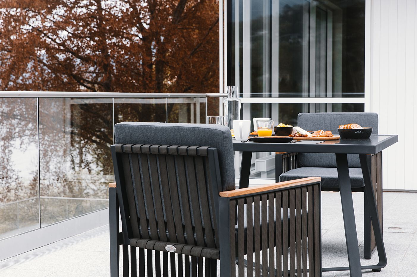 Outdoor dining area at Hardanger House, perfect for breakfast with a fjord view.