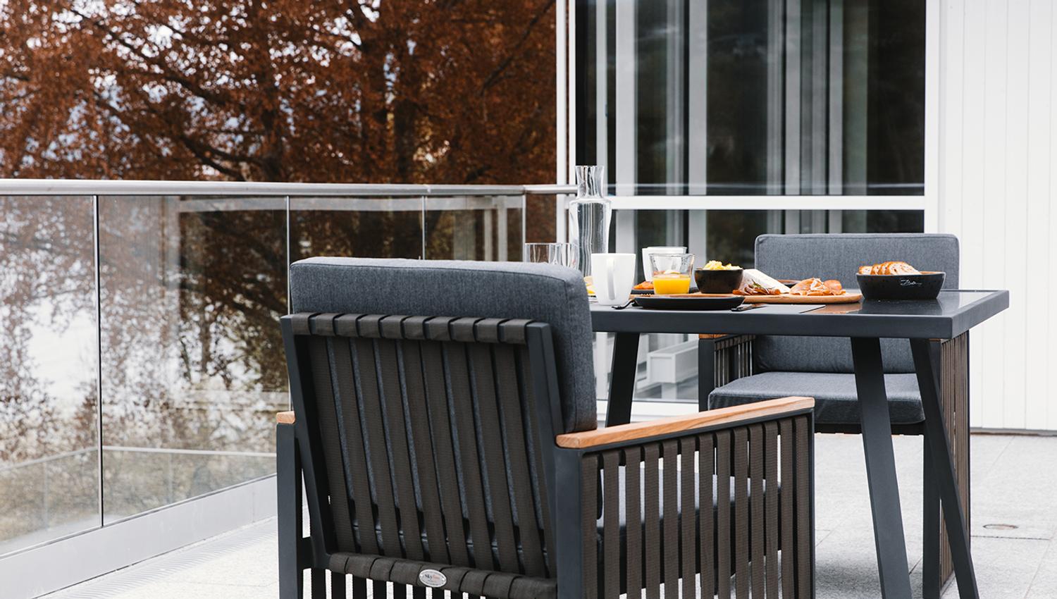 Outdoor dining area at Hardanger House, perfect for breakfast with a fjord view.