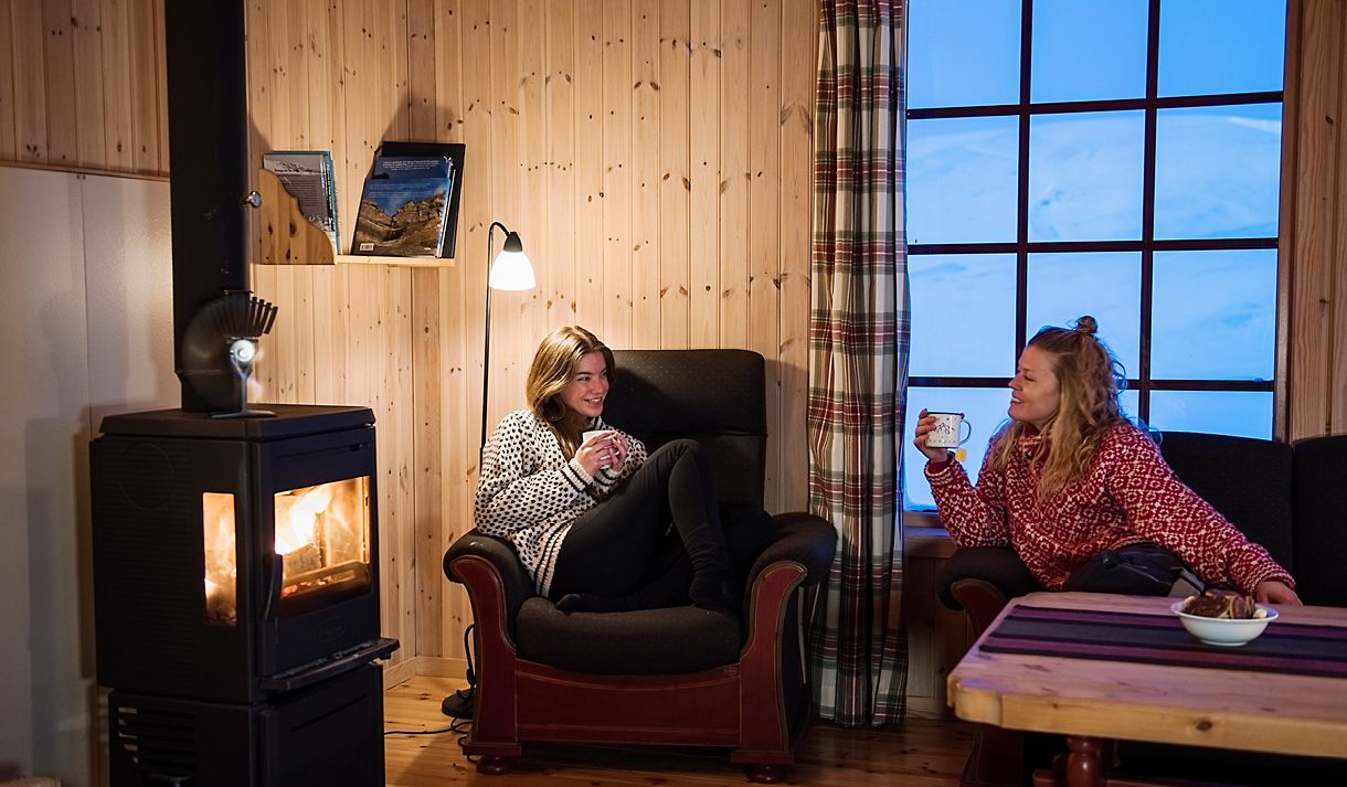 Two friends relaxing in the lounge