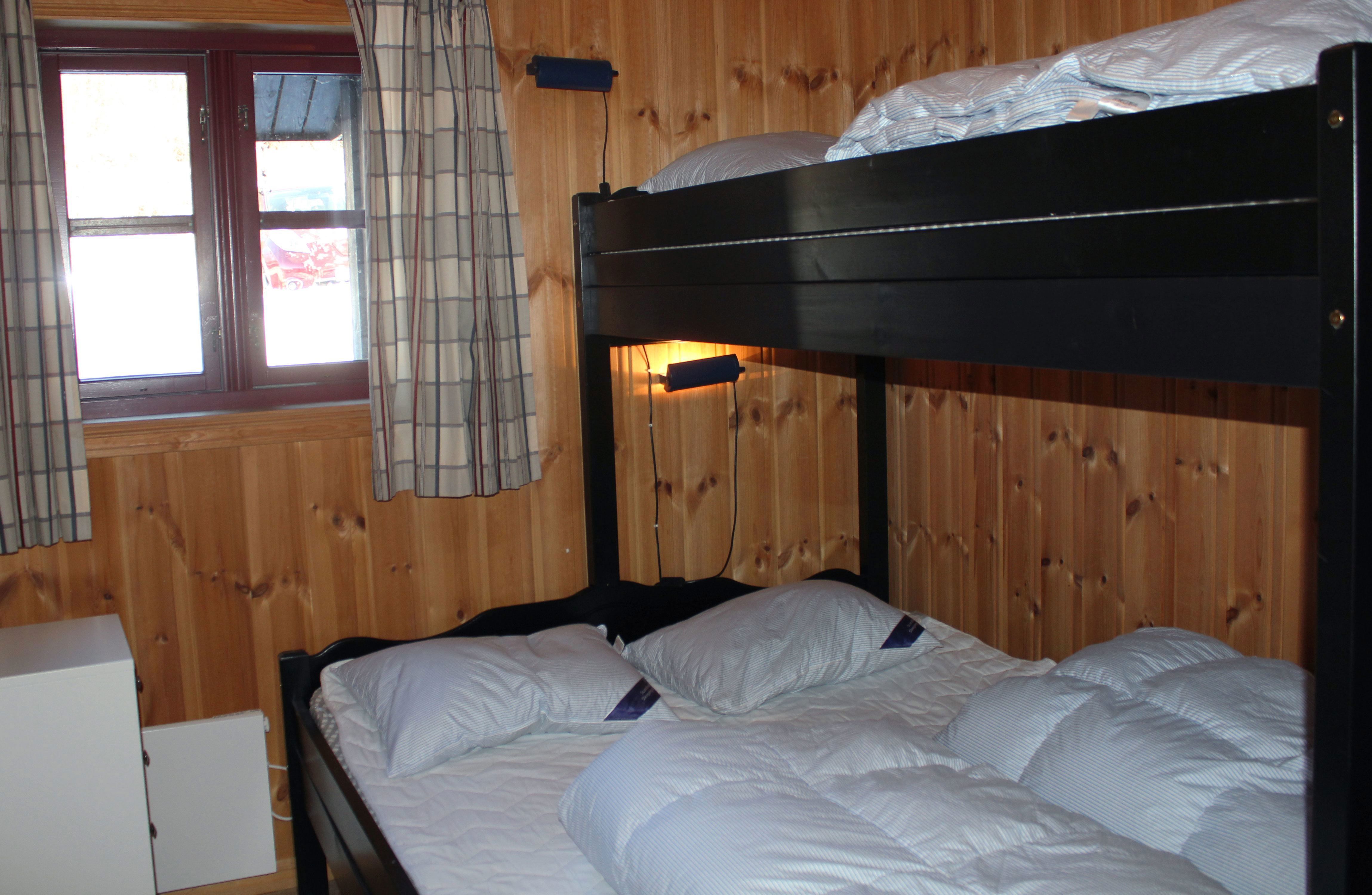 A bunk bed in a room.