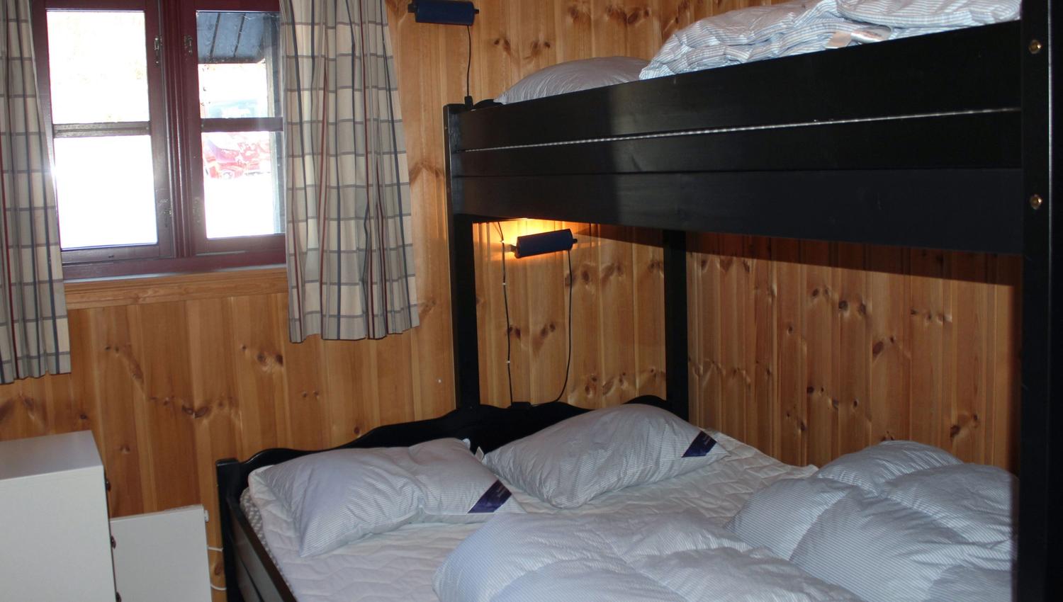A bunk bed in a room.