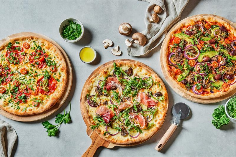 Detail photo of vegetarian pizzas.