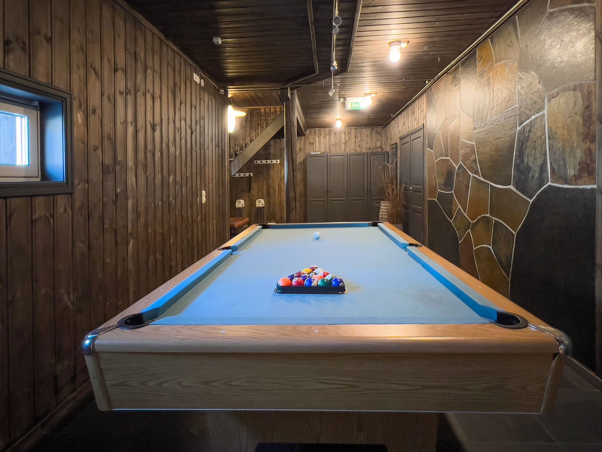 A pool table with balls on it.