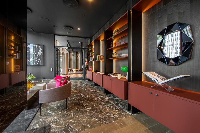 Bookshelf entrance into Shutter Bar