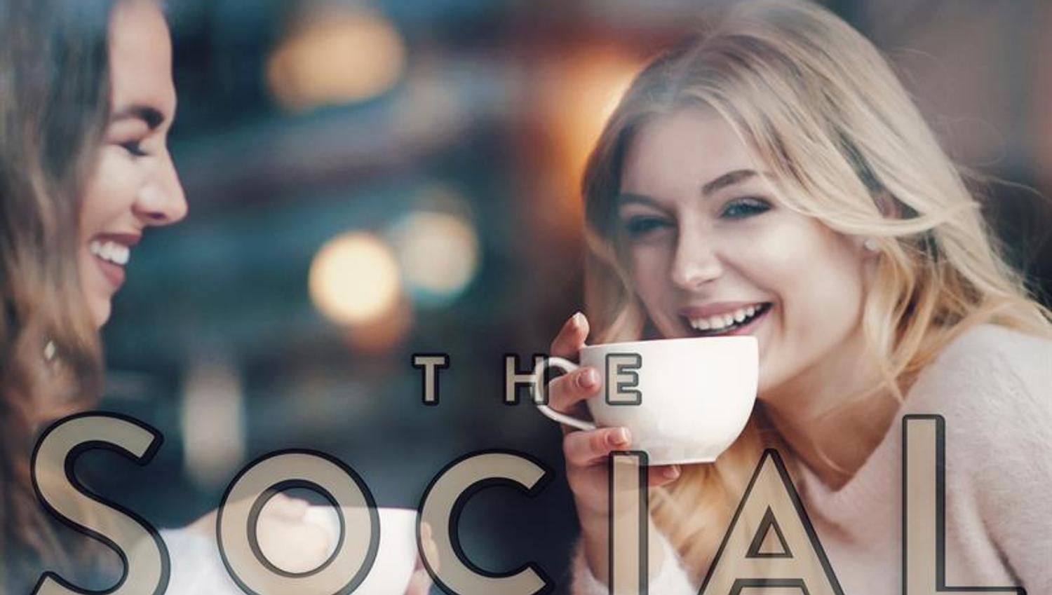 Two girls drinking coffee