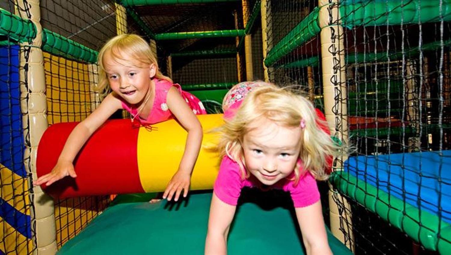 Children have fun ar the playground.