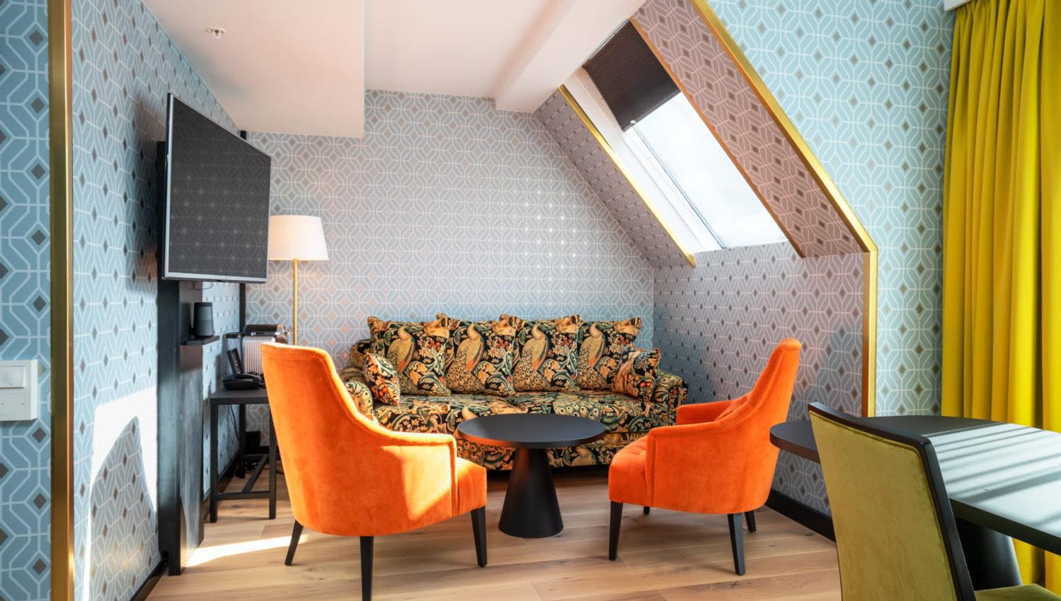 sofa and armchairs in front of the TV