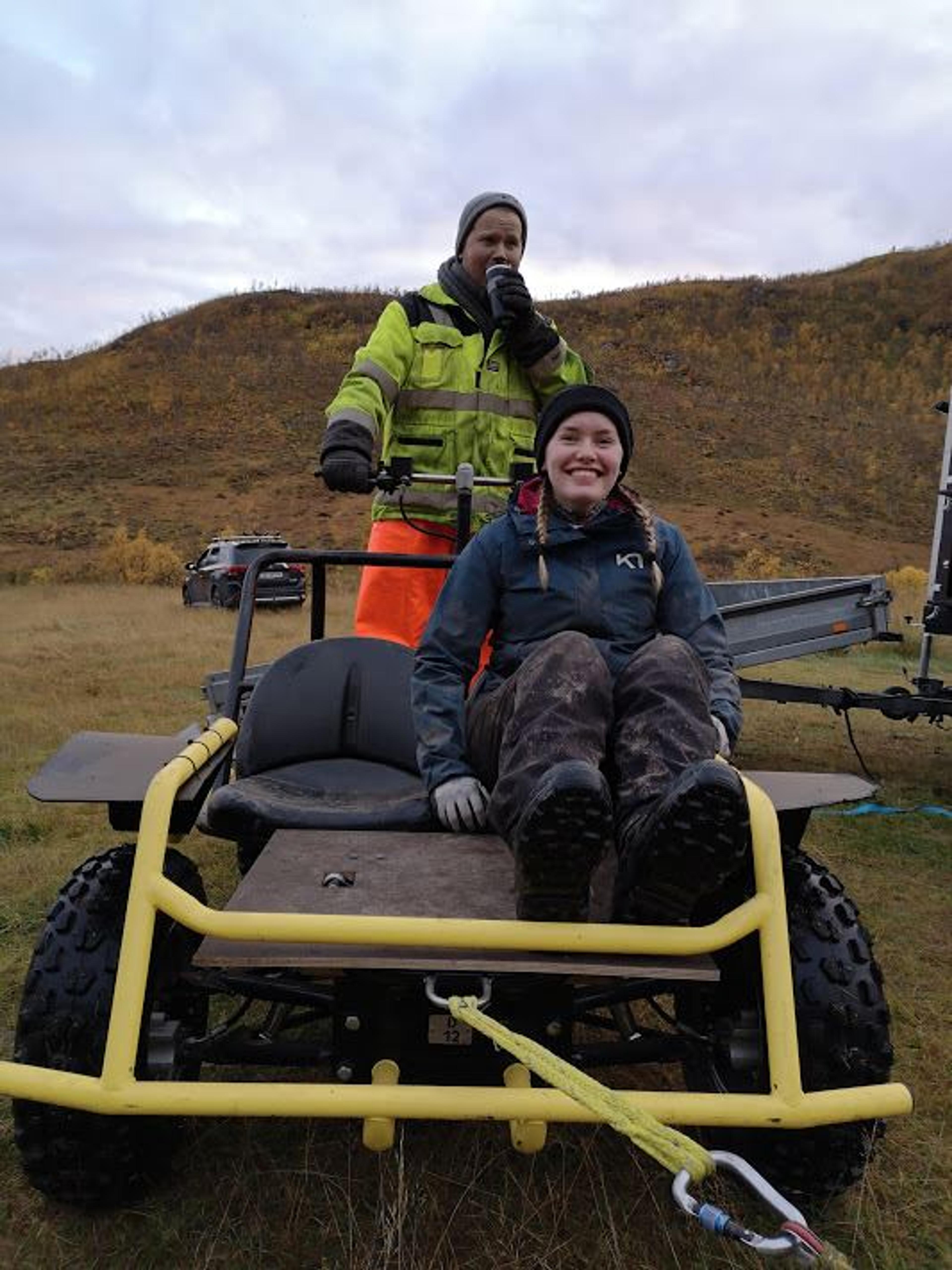 Guest on a Dog Sled wagon