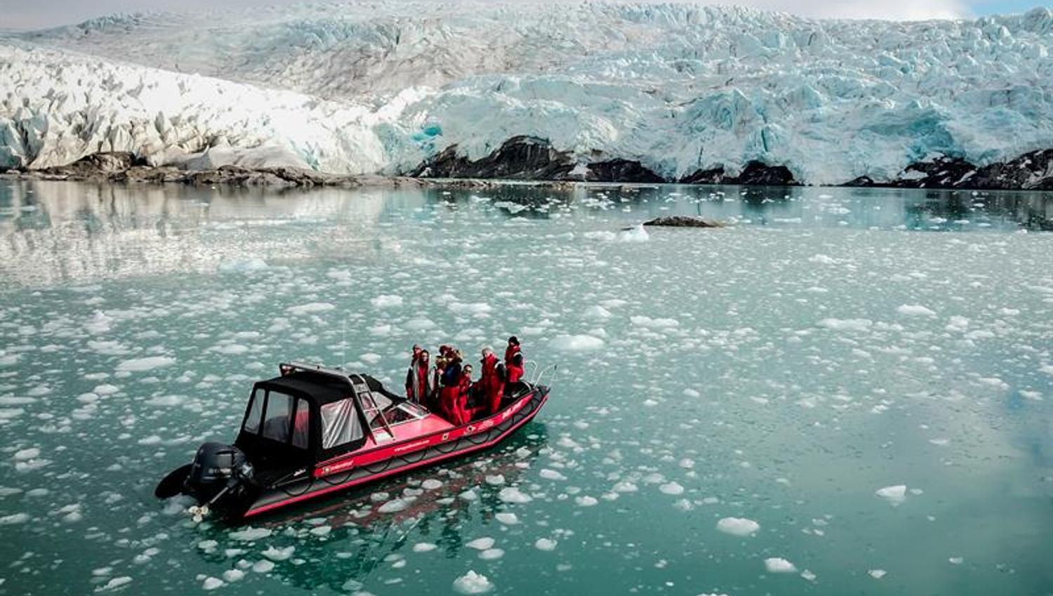 A RIB boat in front of the Nordenskiöld Glacier