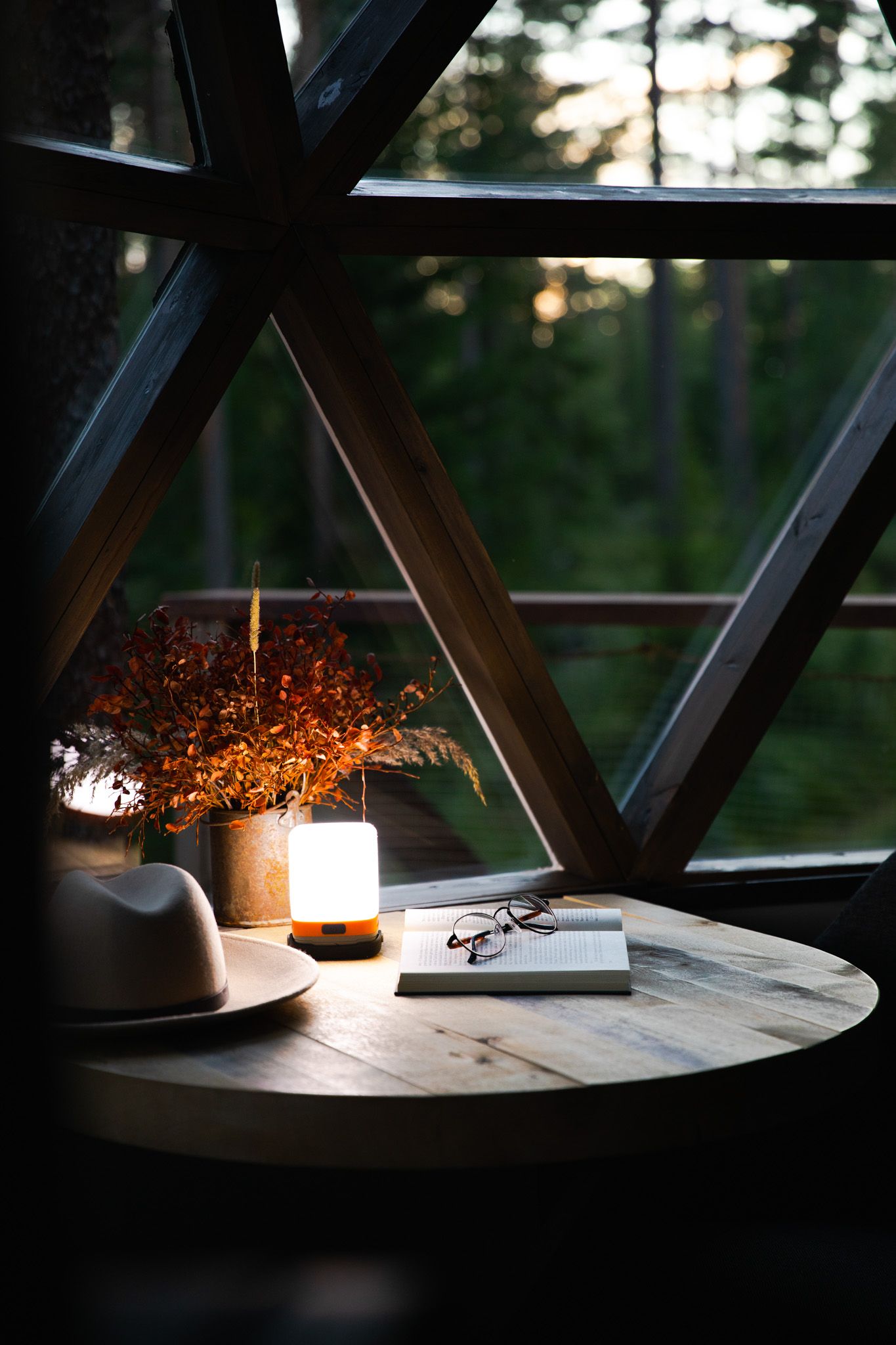 candle and book on a table