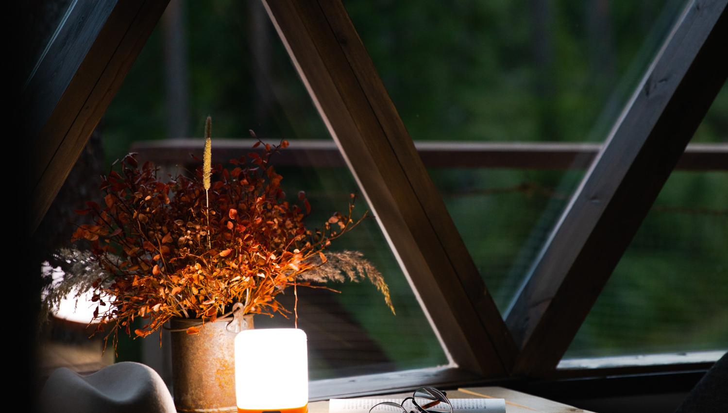 candle and book on a table