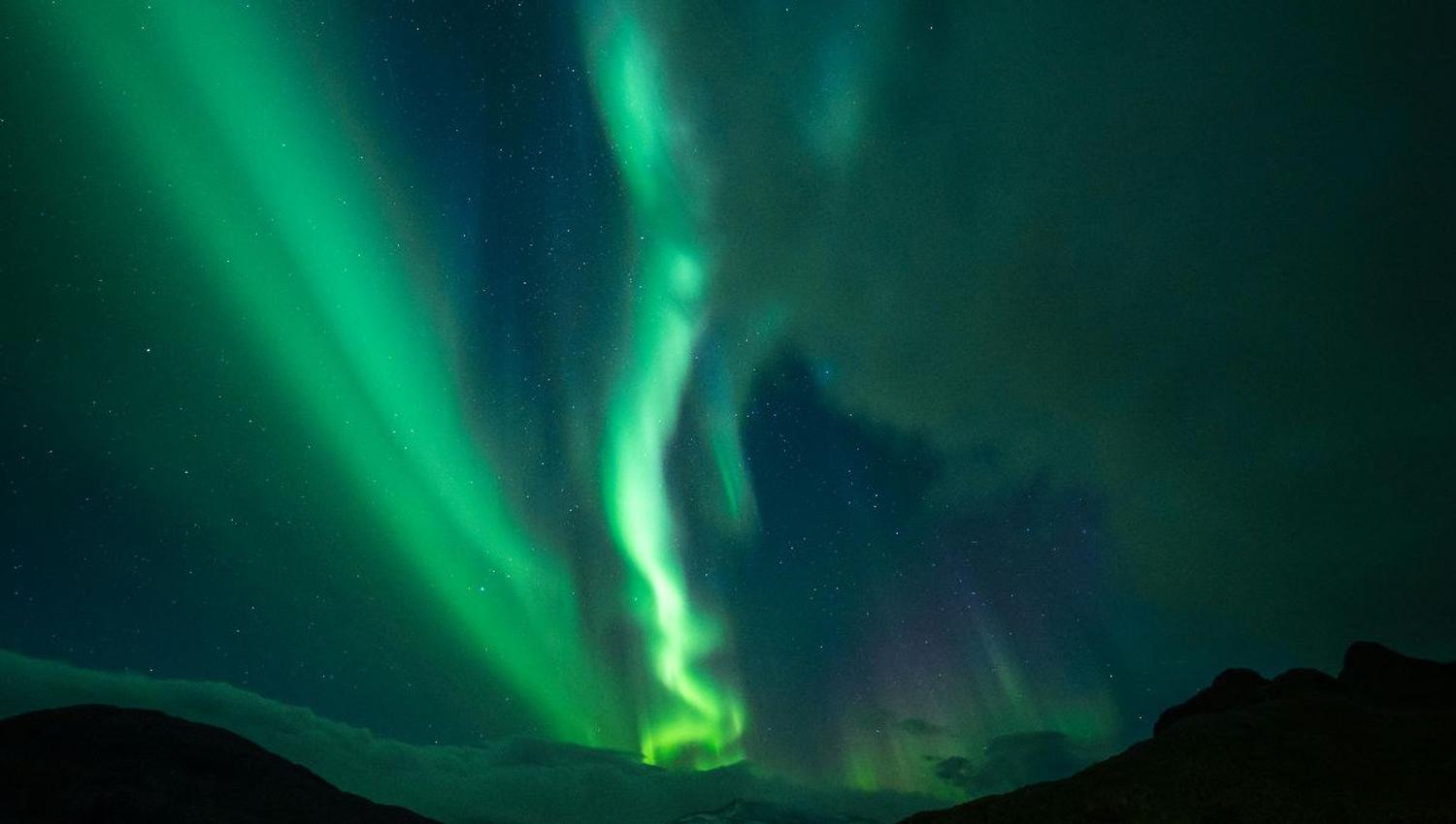 Northern Lights dancing across the sky