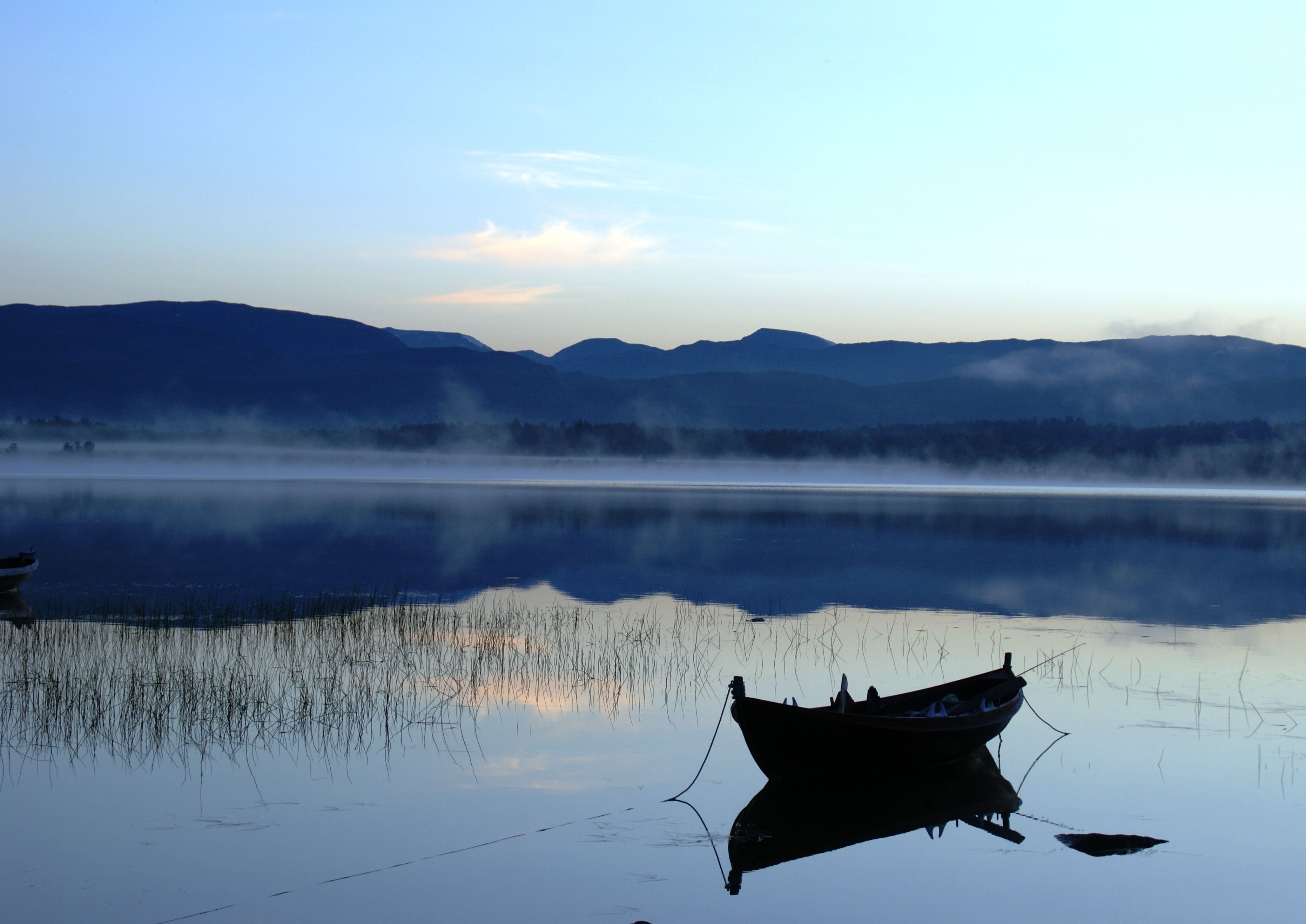a lake with a boat