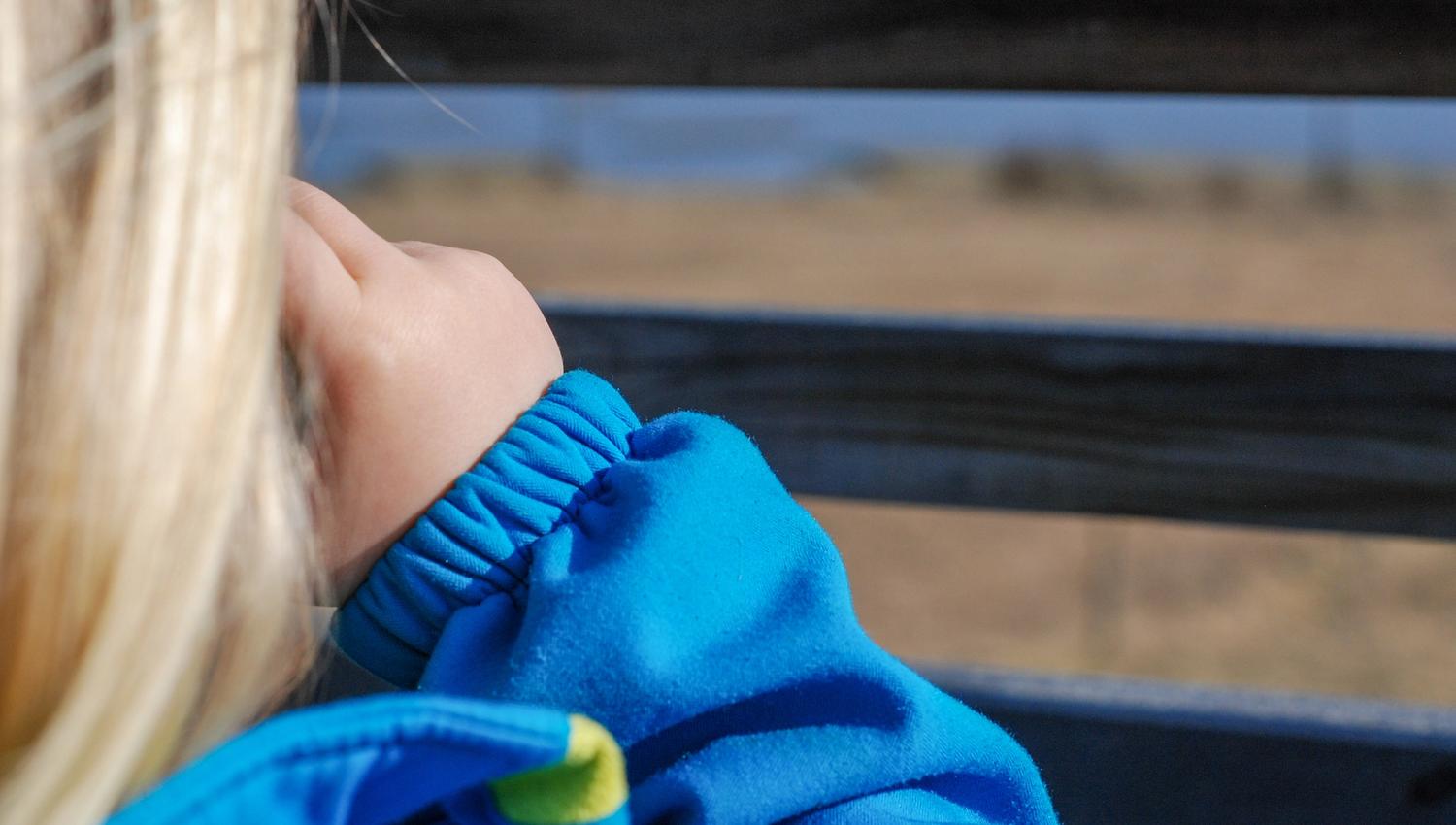 girl looking with binoculars