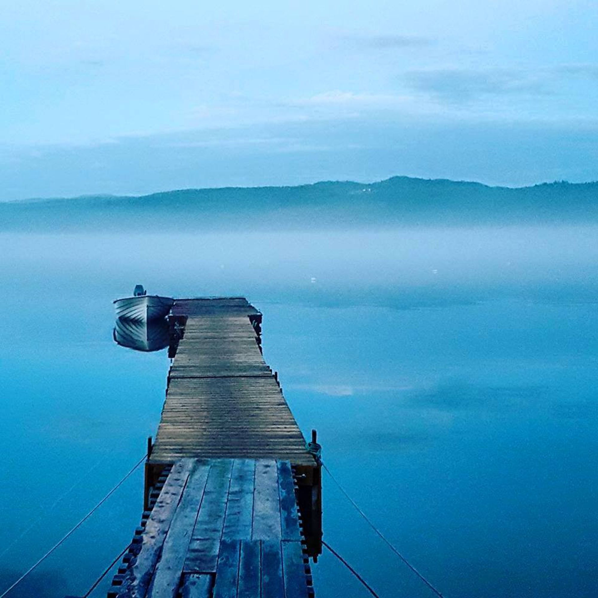 Enchanting shot of the pier at Kvam Motell and Camping
