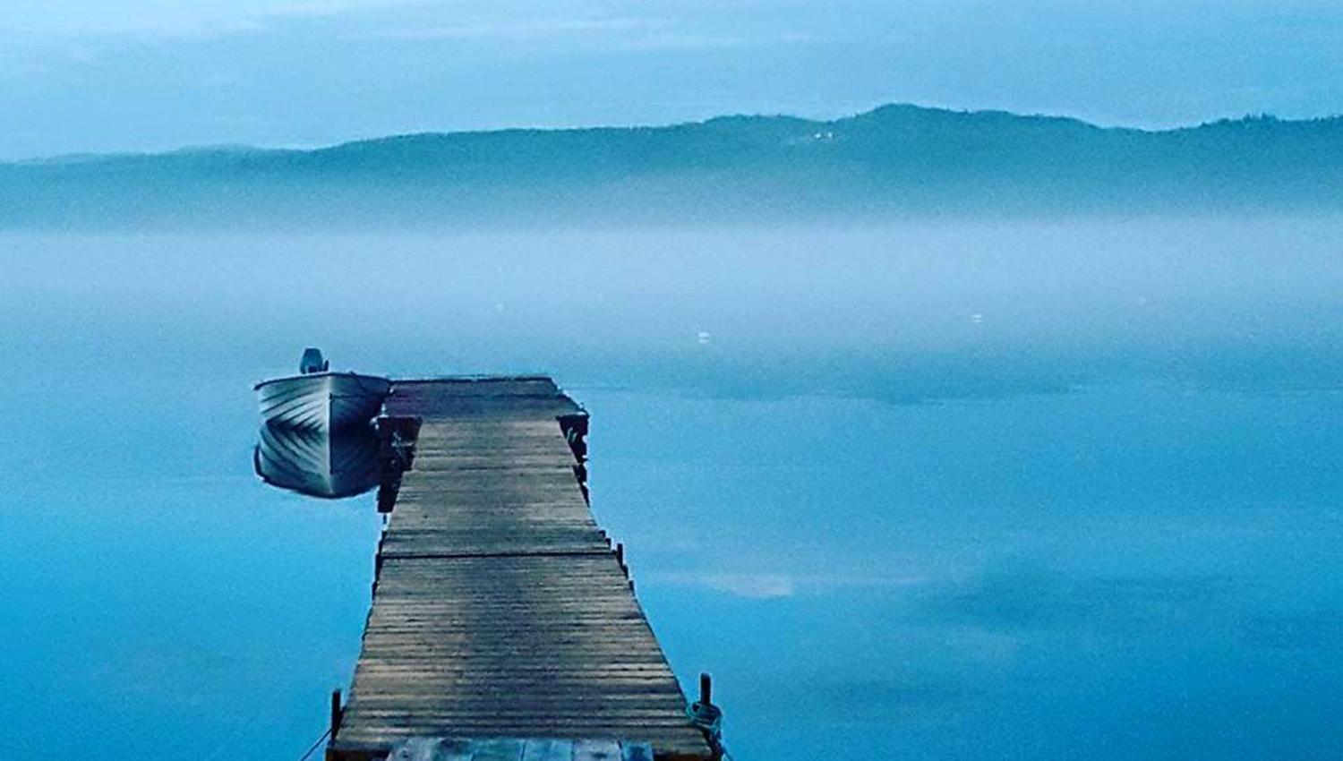 Enchanting shot of the pier at Kvam Motell and Camping
