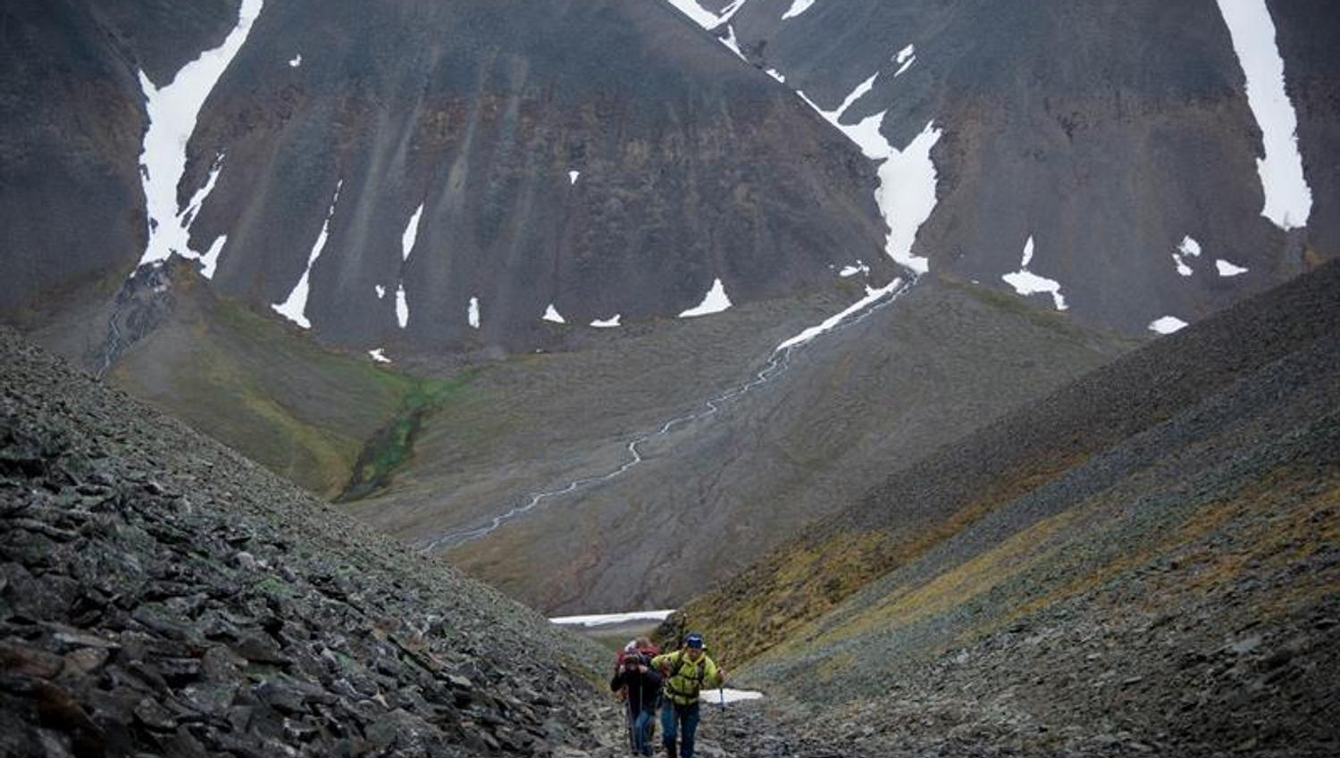 People hiking up a mountain