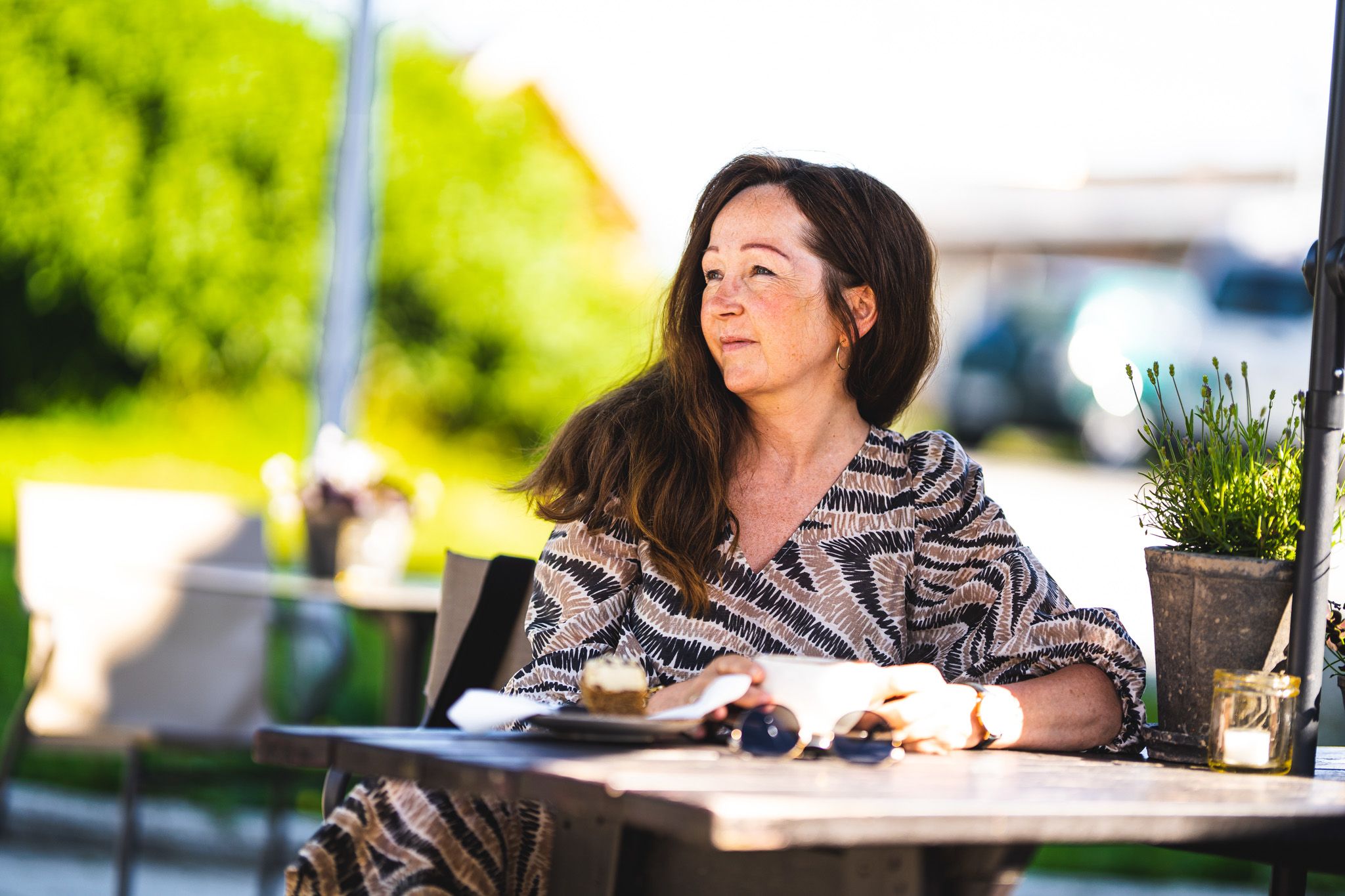 woman sitting at a cafe