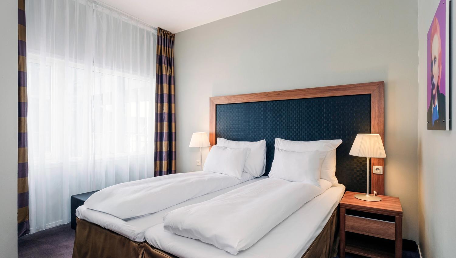 Superior bedroom with twin beds