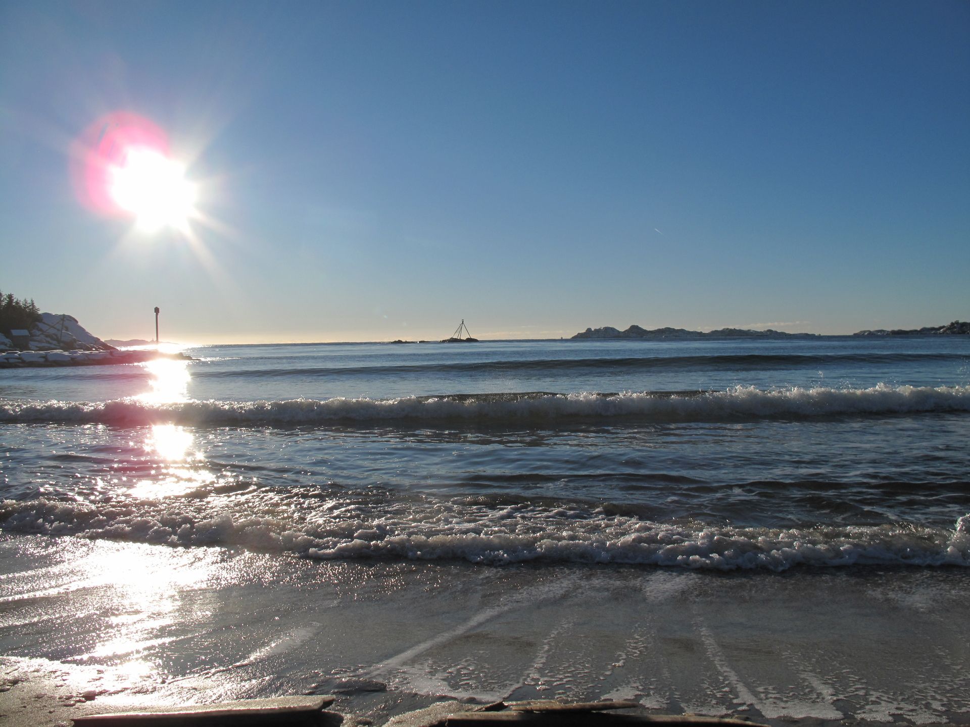 Bølgeskvulp på stranden Sjøsanden