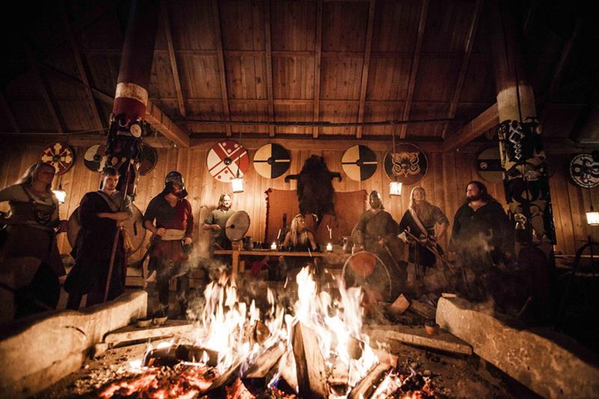 Party around a fire, in Viking costume