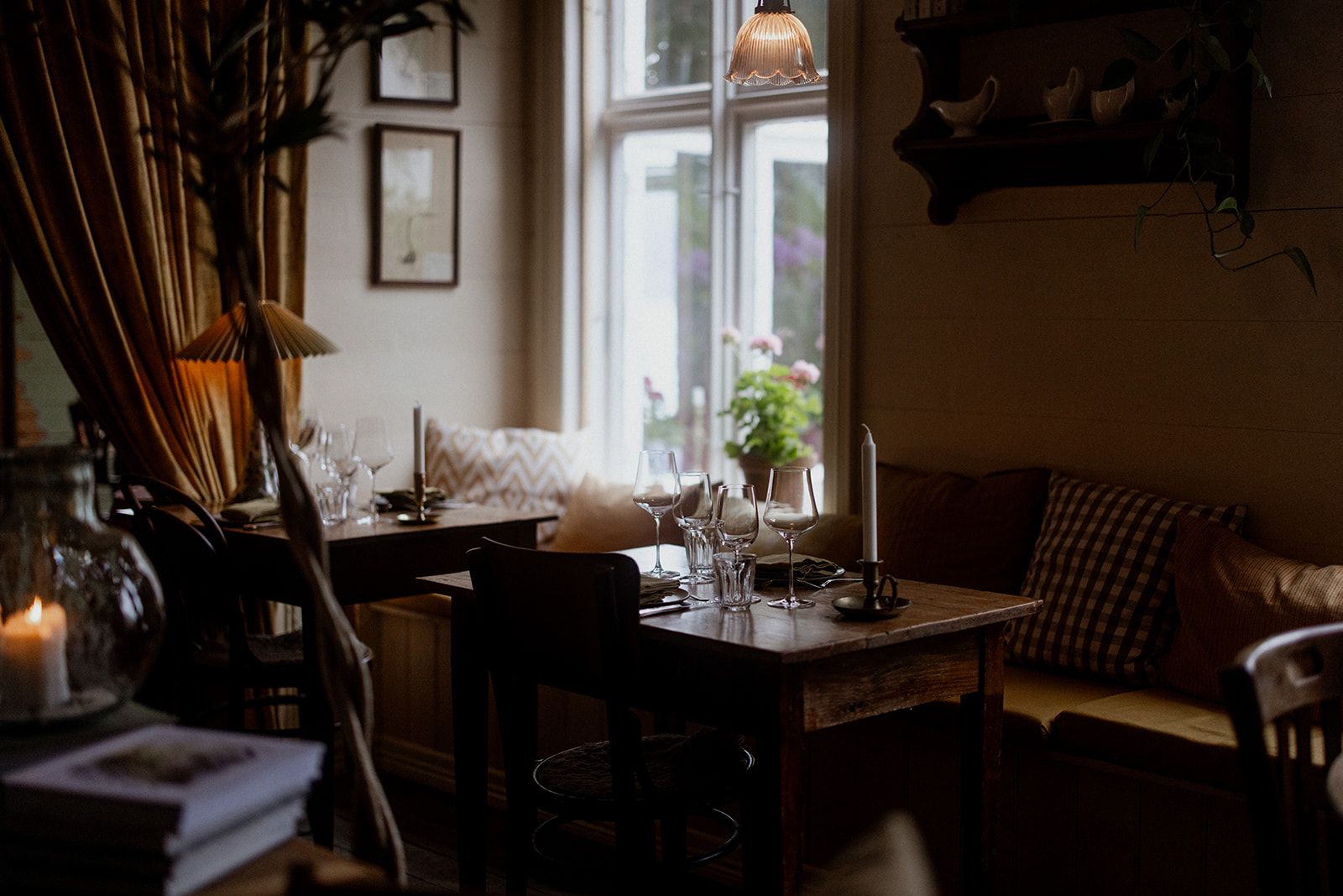 Charming dining spot at Hotel Sundal – offering a cozy vibe and views of the fjord garden.