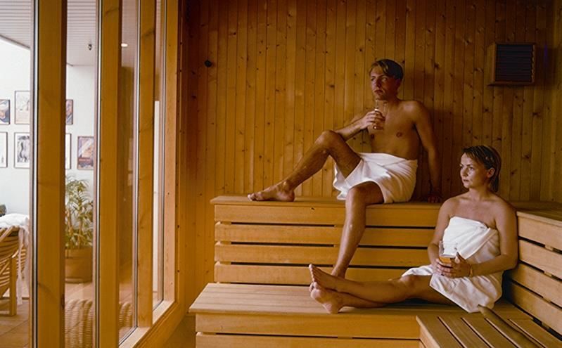 Two people in a Sauna