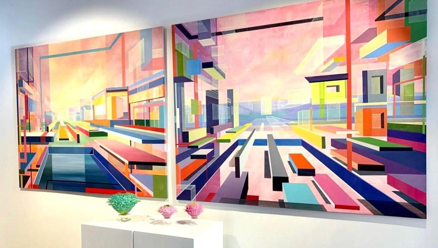 2 abstract artworks on wall in retro colors