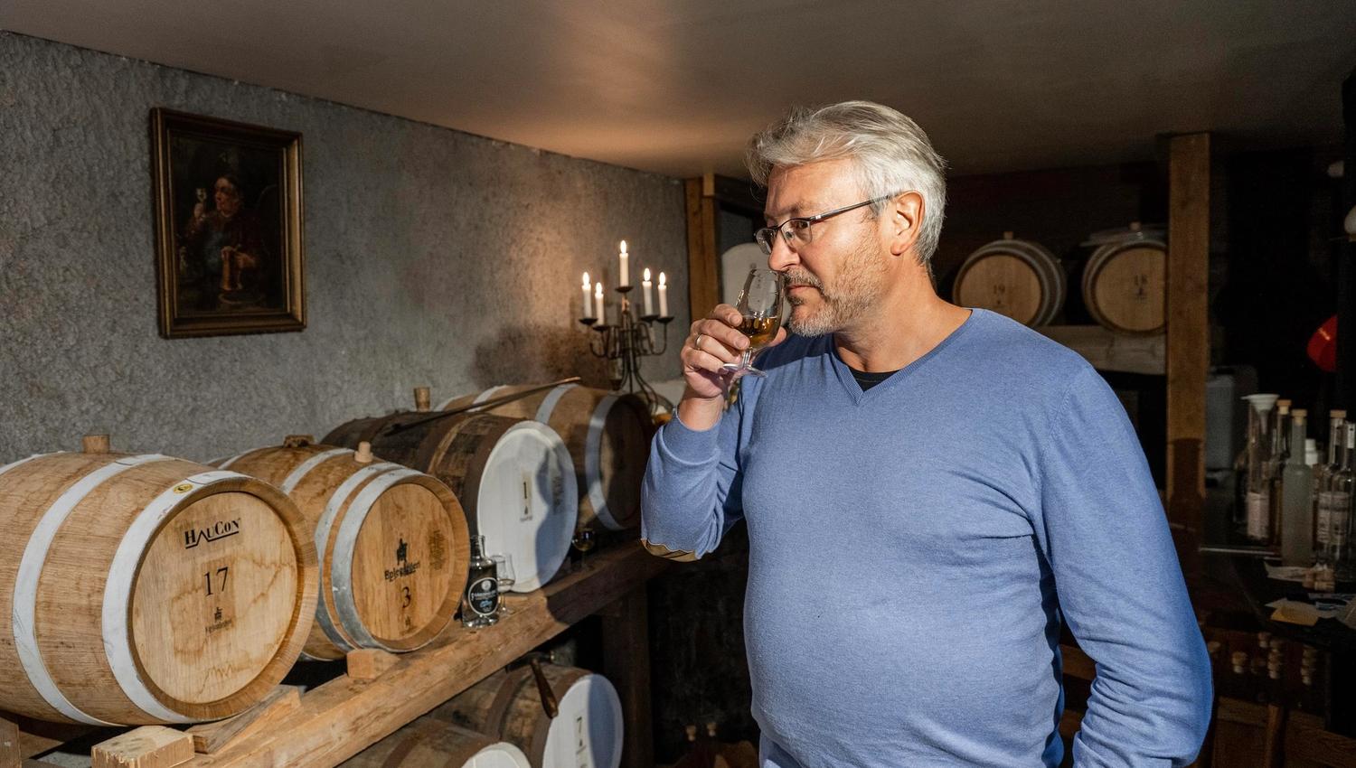 Man smelling the apple liqour