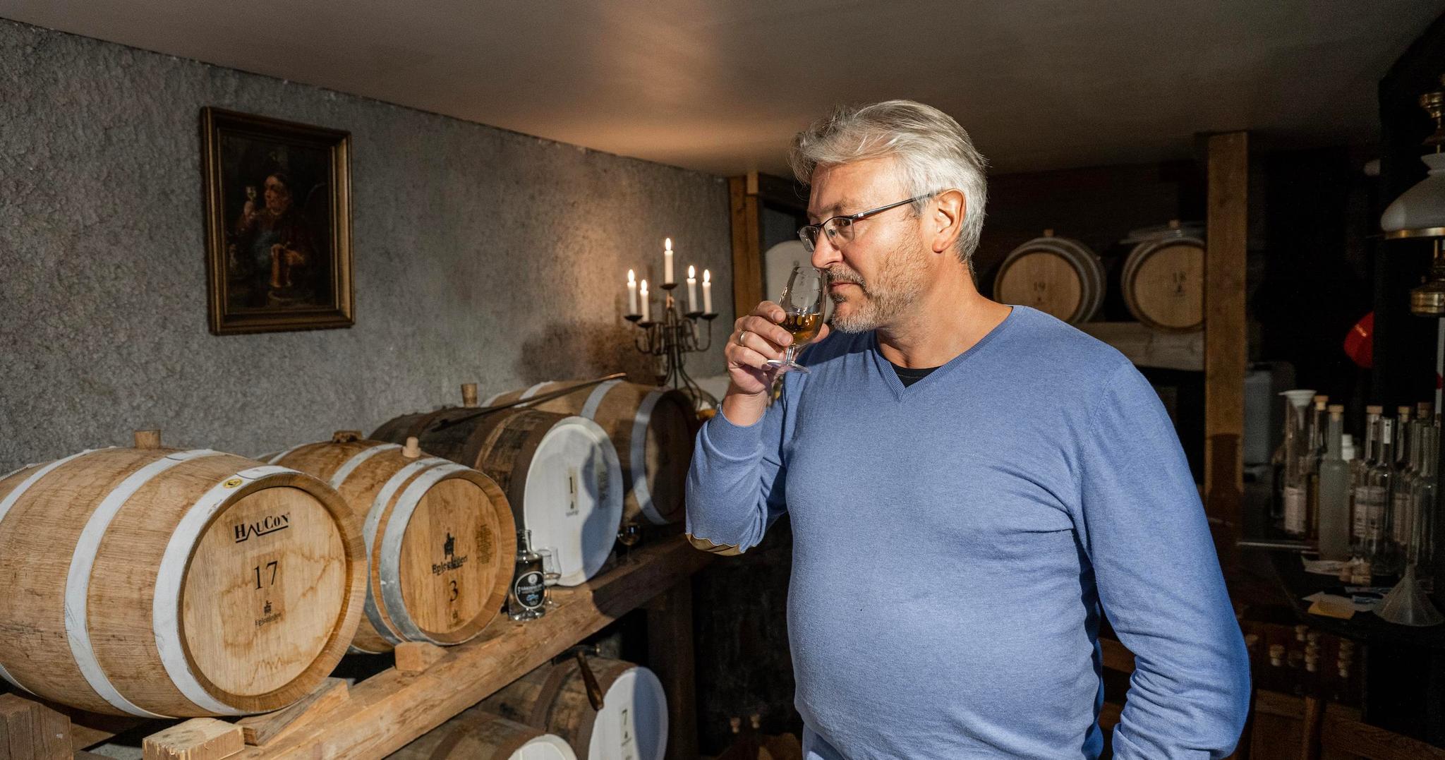 Man smelling the apple liqour