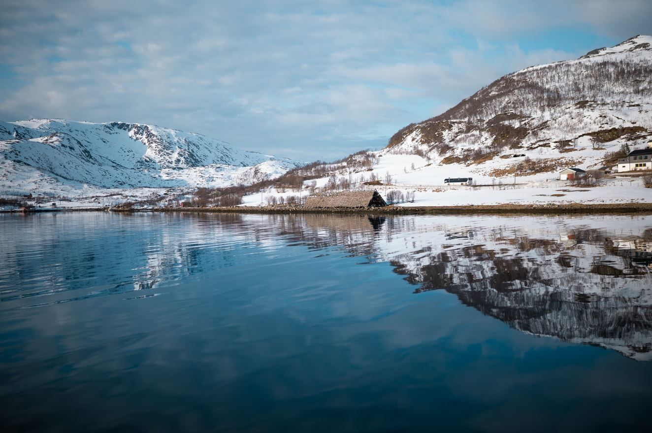 View of the fjord and snow covered mountains
