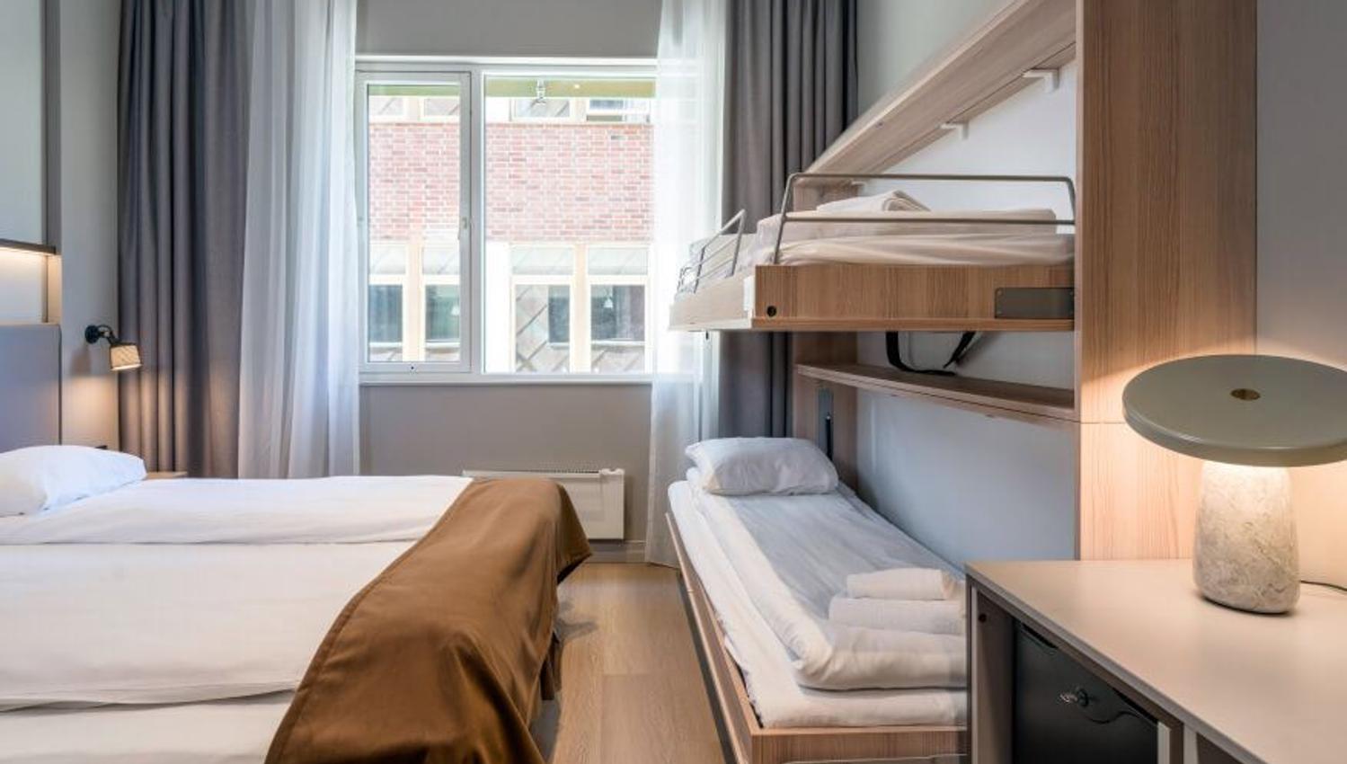 Family room with bunk beds at Quality Hotel Saga in Tromso