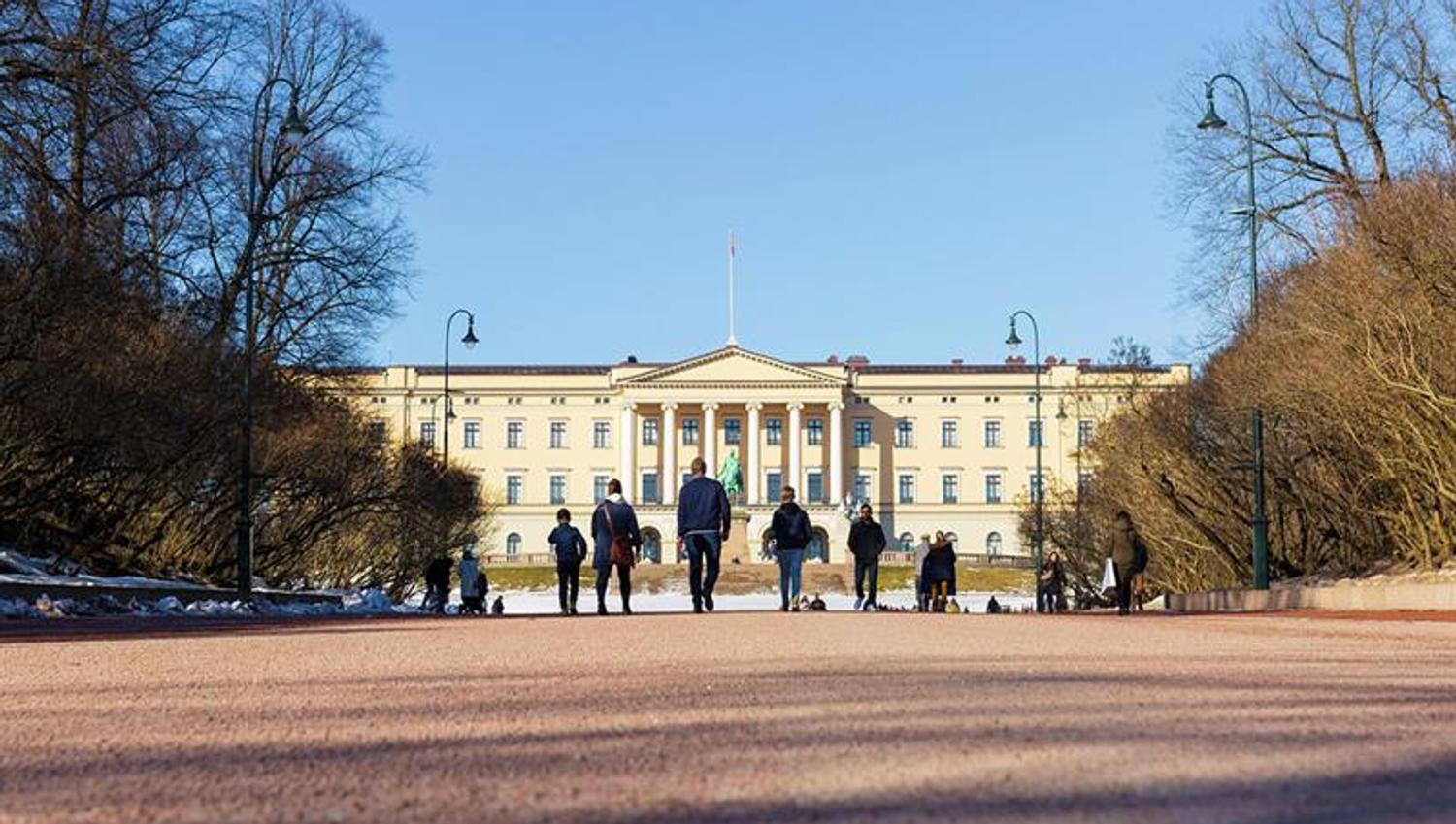 People in front of the Royal Palace