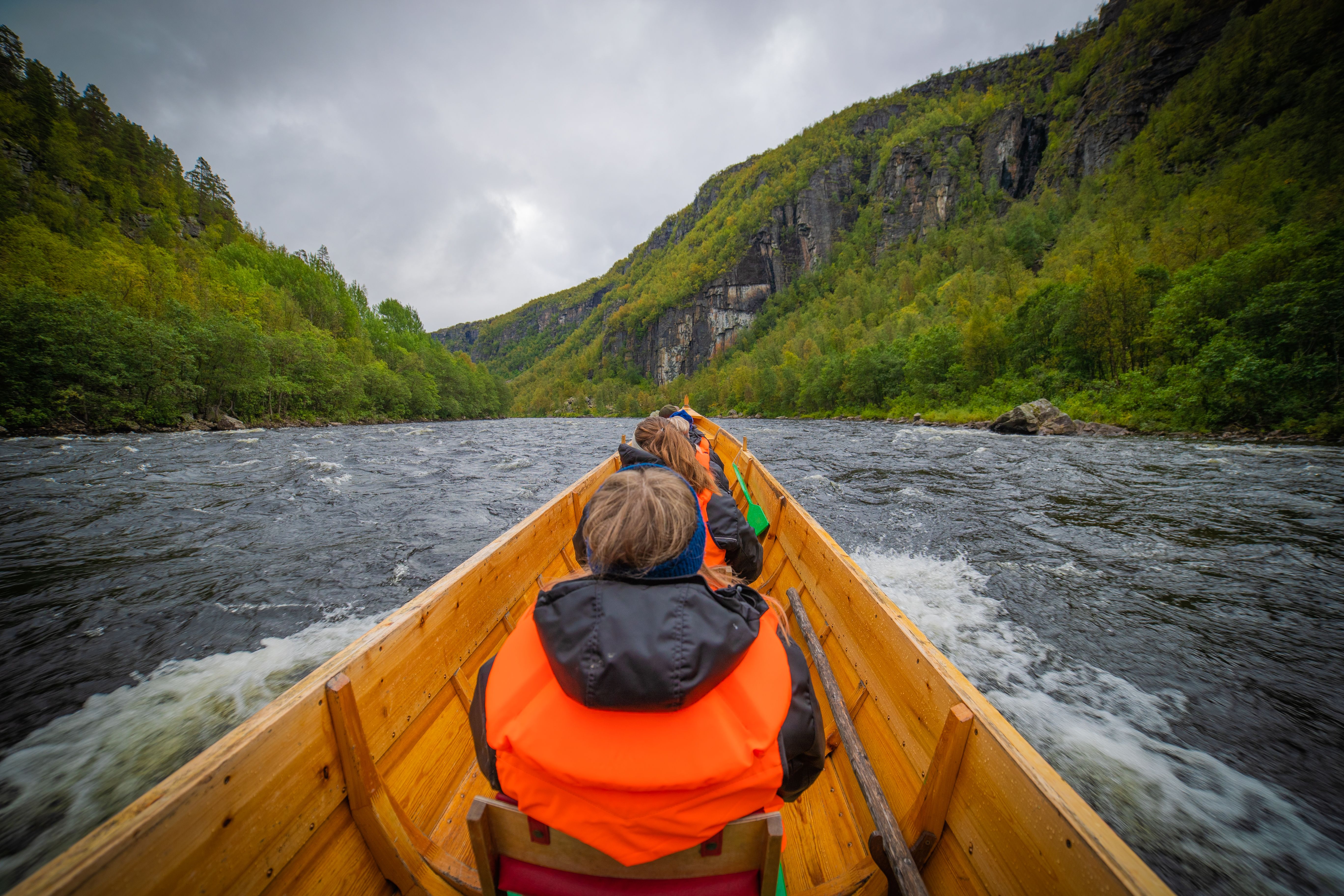 Experience the thrill of river exploration from the comfort of a traditional wooden boat. Surrounded by the stunning greenery of hills and the rushing waters, this adventure invites you to connect with nature while enjoying the beauty of the landscape.
