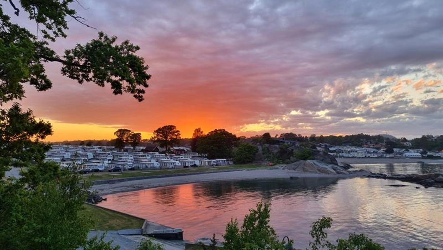 Solnedgang ved stranda