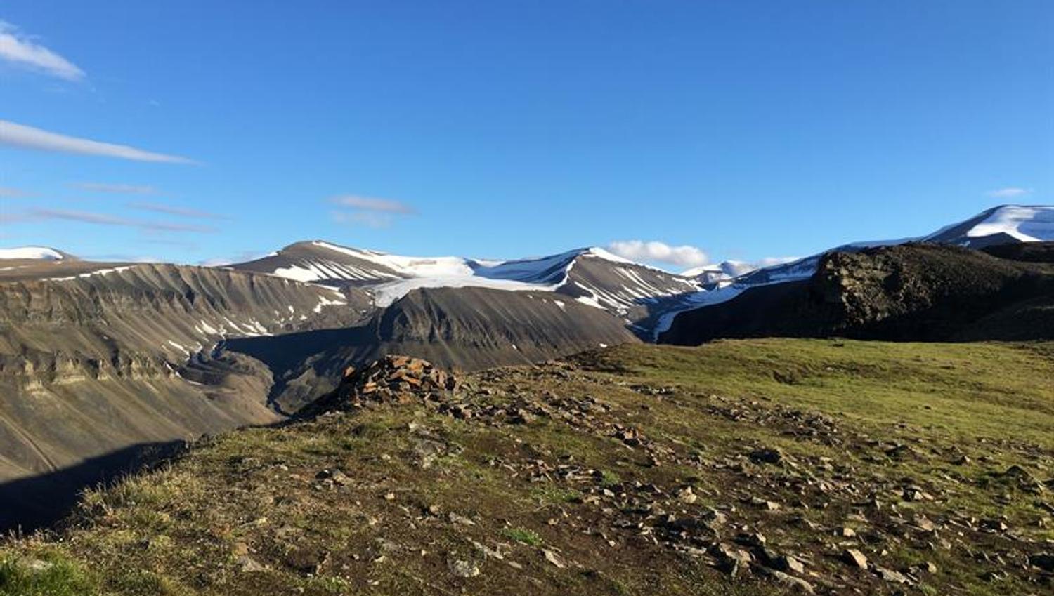 view from top of the mountain with the glaciers in the background