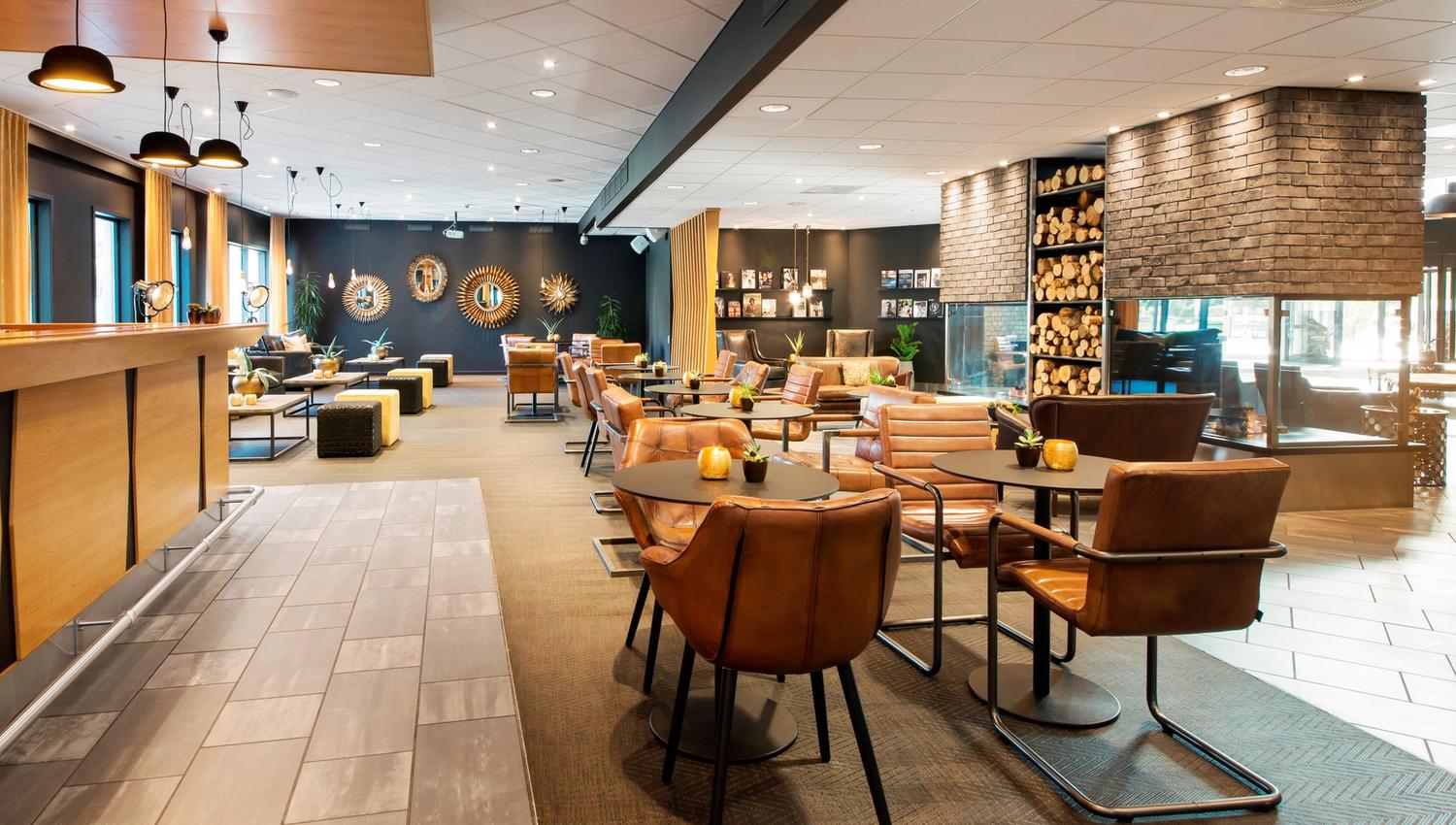 Bar at the hotel, orange decor. Photo
