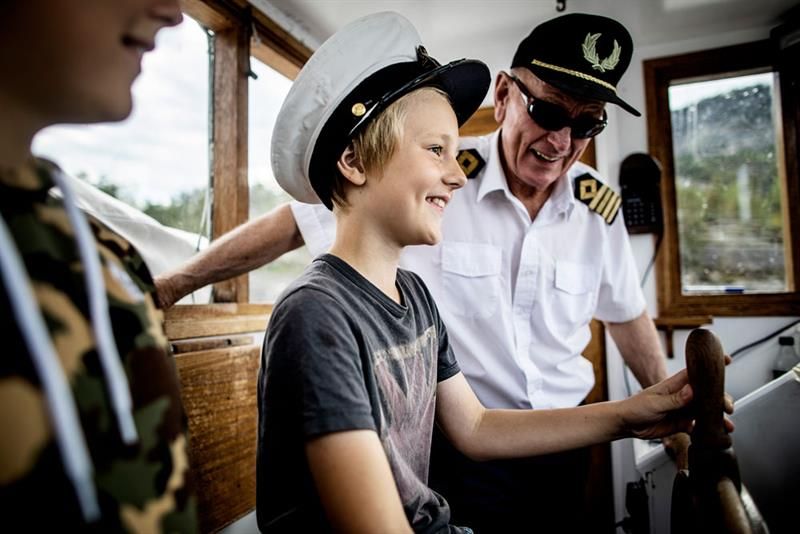 boy with captain on MS Fram 