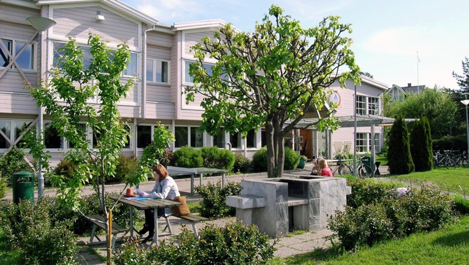 outdoor seating areas with green spaces