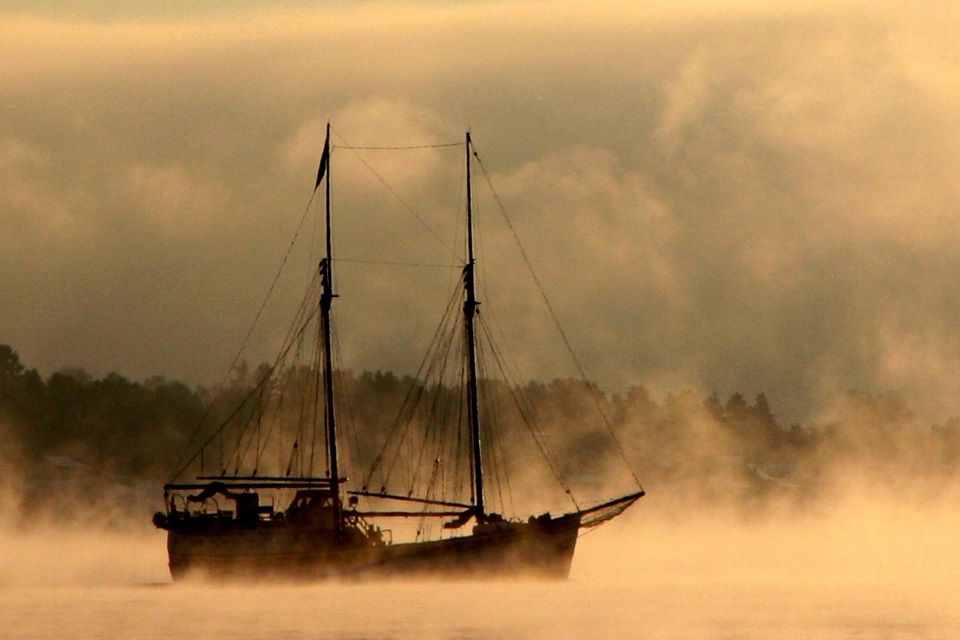 Ship surrounded by fog