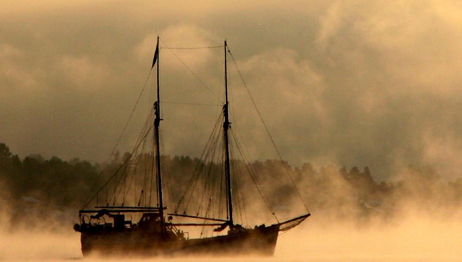 Ship surrounded by fog