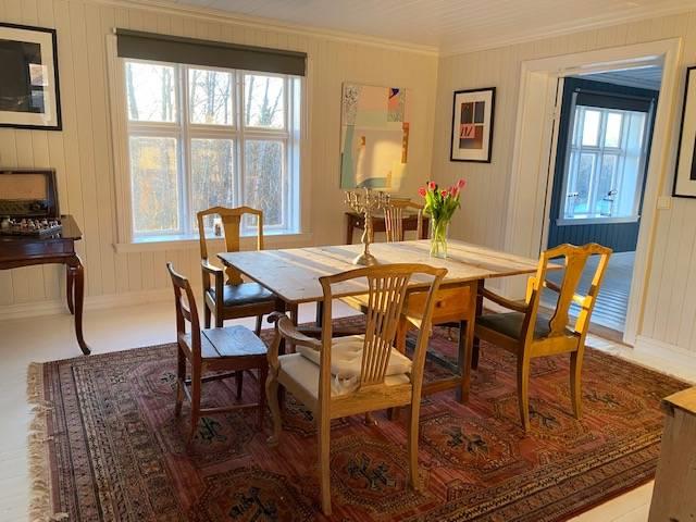 A room with old table, and chairs