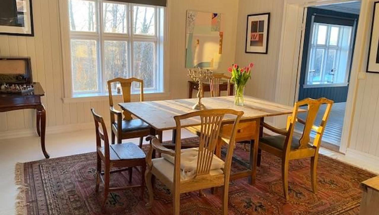A room with old table, and chairs