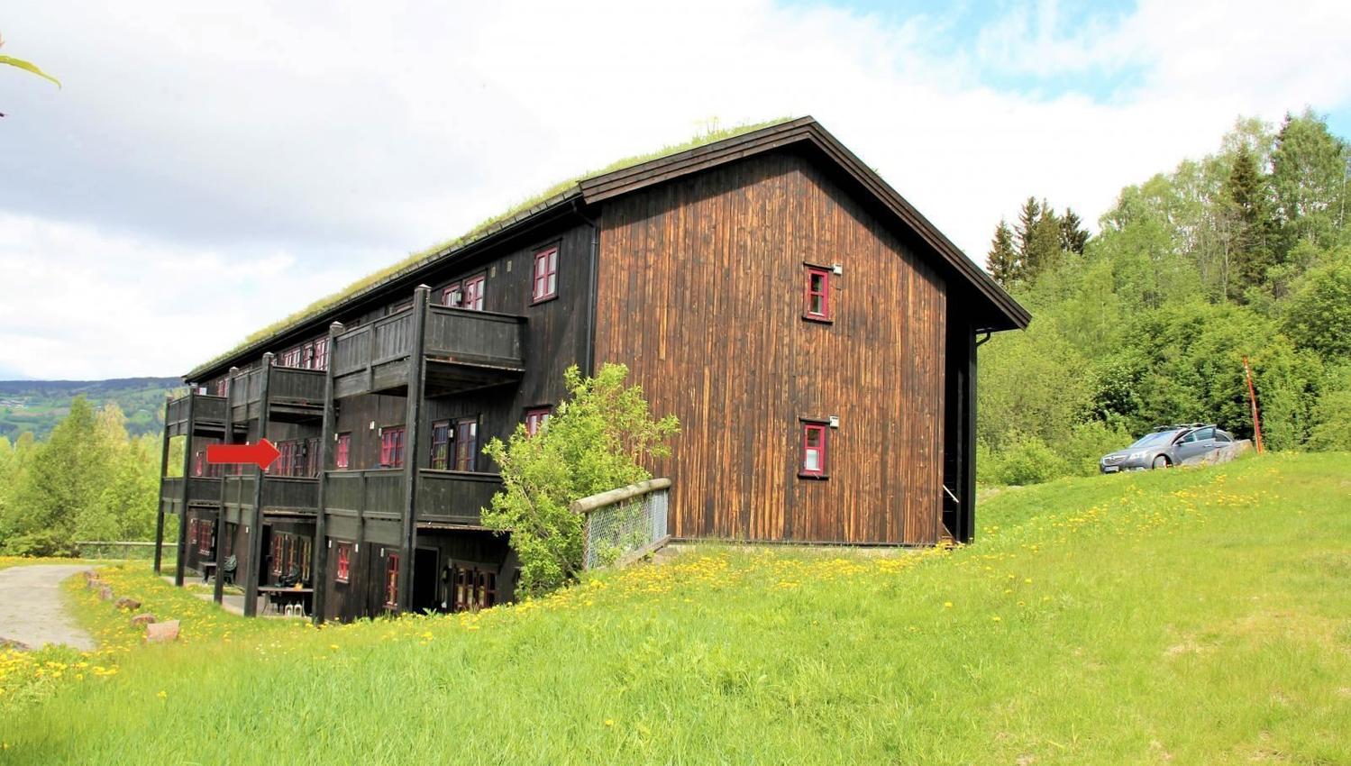 A building with a sign on the side.