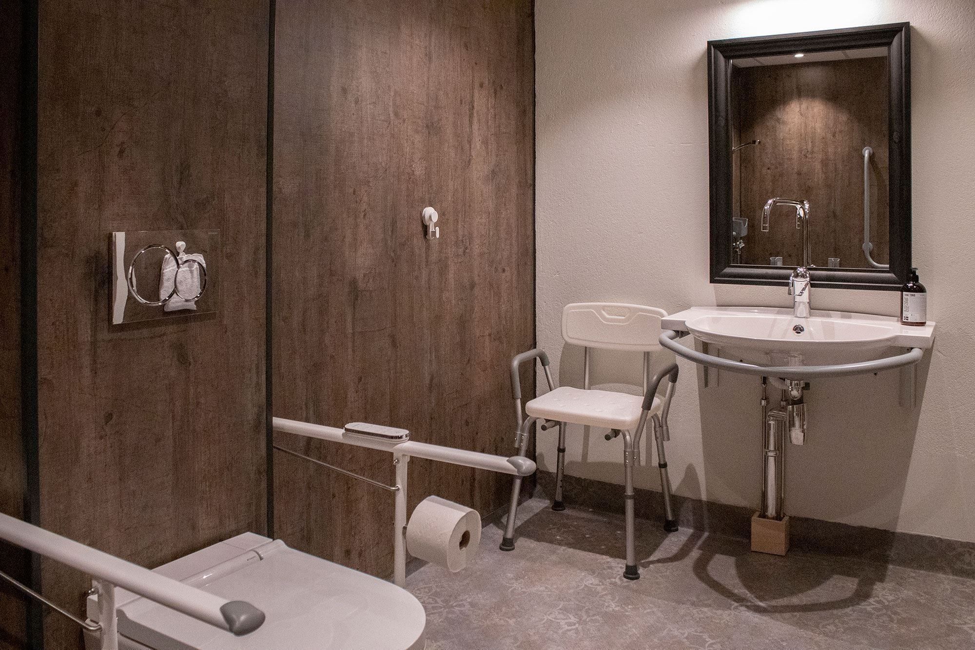 A bathroom with sink and toilet.