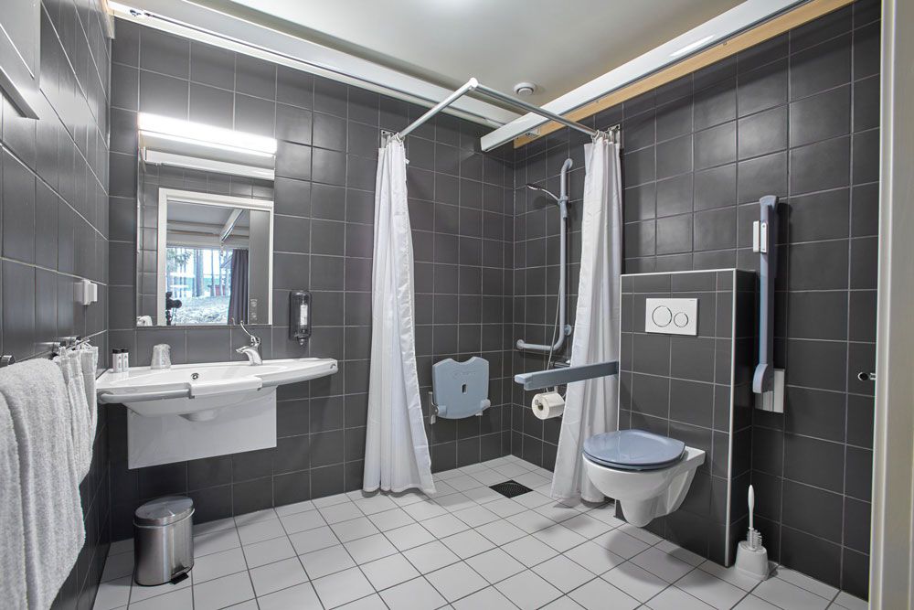 tilrettelagt bad på hotell fritidsparken