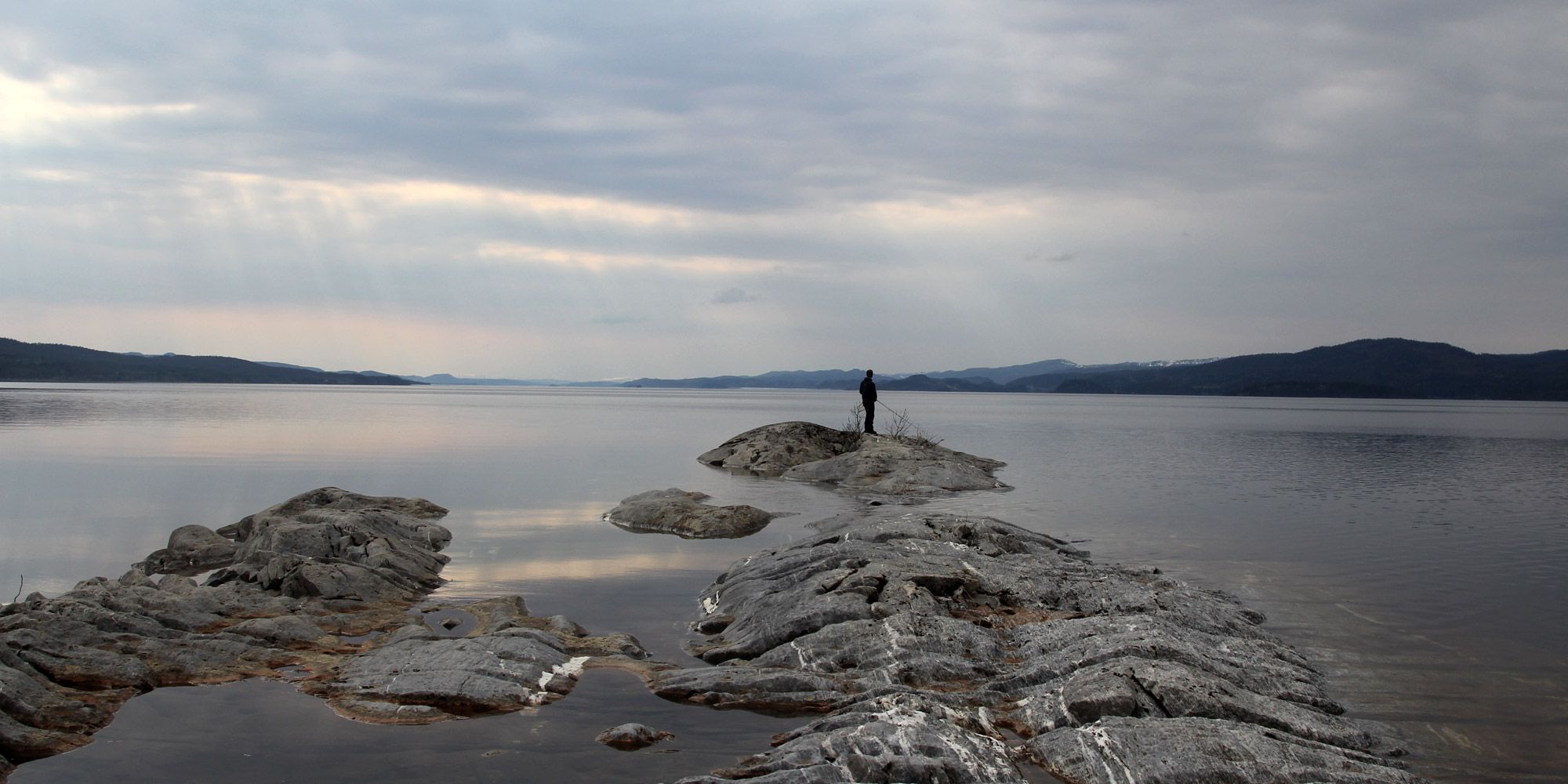 Fishing in Lake Snåsavatnet by Oldernes StrandCamp