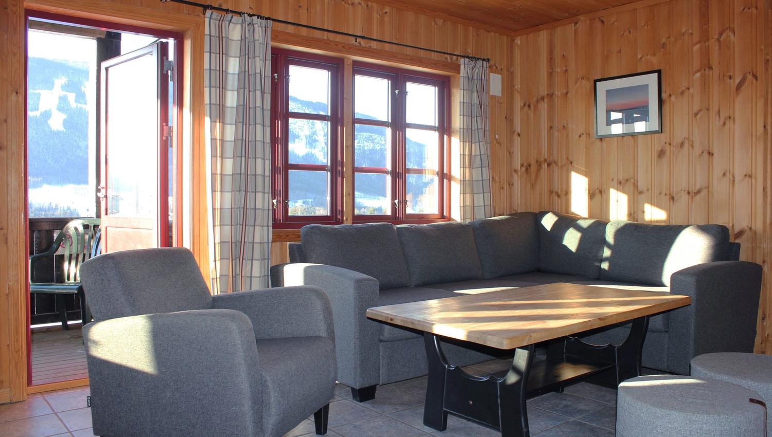 A sofa and a table in a room.