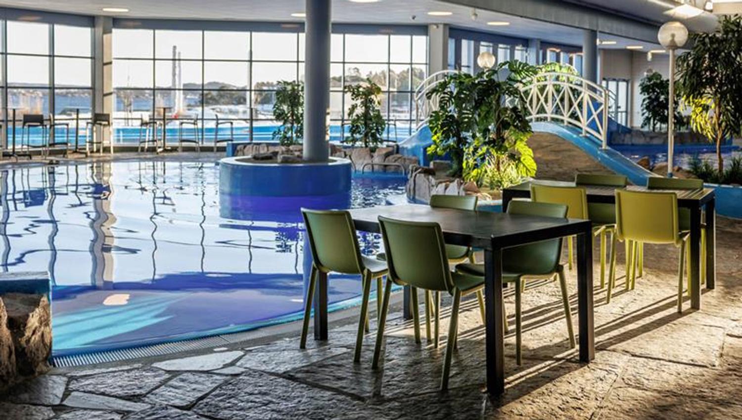lounge with dining areas in the water park in Langesund