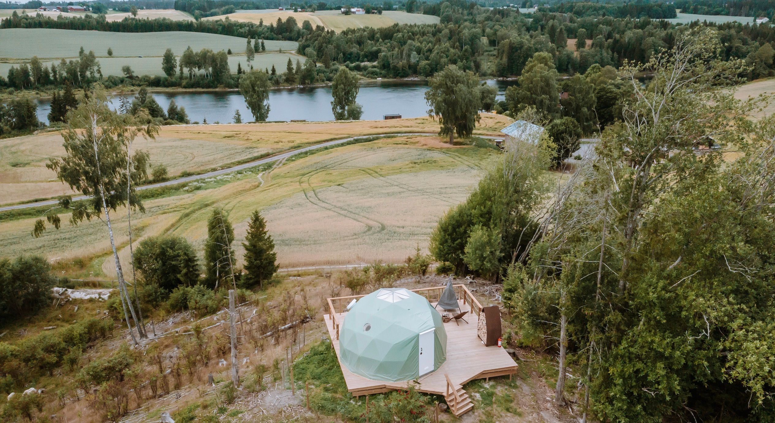 The dome seen from above with trees around   